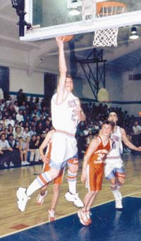 Kris Dufner with Catholic League Basketball champions